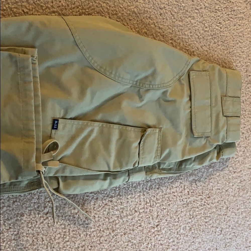 Women’s tan 5.11 pants. Medium waist.